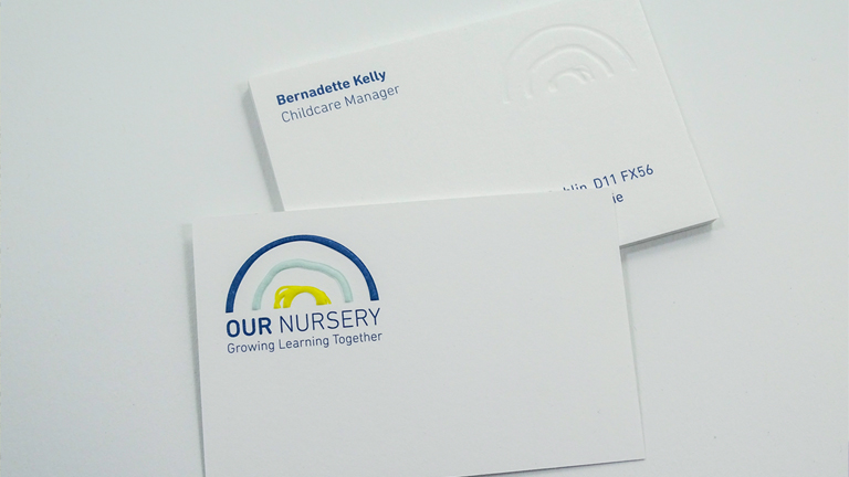 Our Nursery Ballymun, business card, design by UNIT. Studio Dublin. Displaying front and back of card, highlighting the embossed printing technique employed.